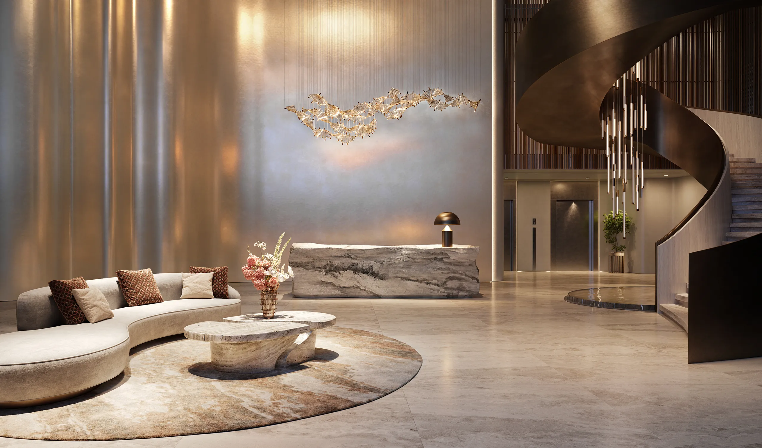 Modern lobby with curved beige sofa, round stone coffee tables with floral arrangement, marble reception desk, spiral staircase, and abstract hanging light fixtures.